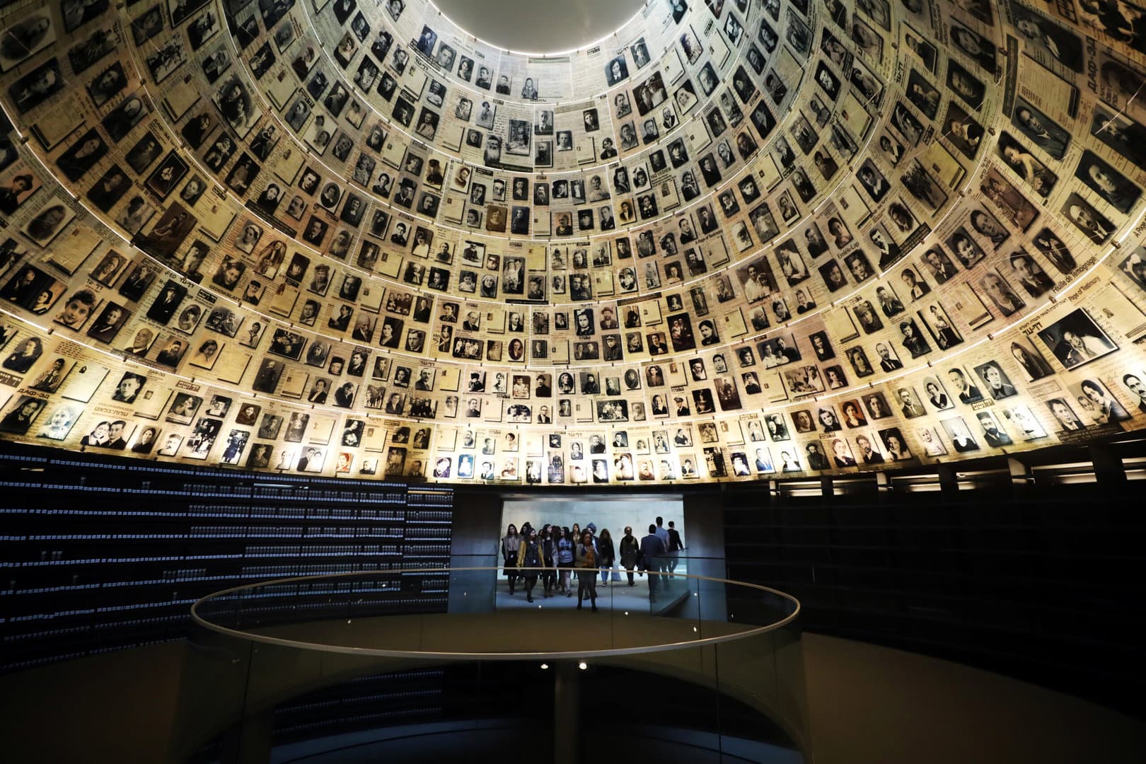 Visitors enter the Hall of Names to look at pictures of Jews killed in the Holocaust during a visit to the Holocaust History Museum at the Yad Vashem World Holocaust Remembrance Center in Jerusalem January 15, 2020. Picture taken January 15, 2020. REUTERS/Ammar Awad - RC2OJE9TLU3I